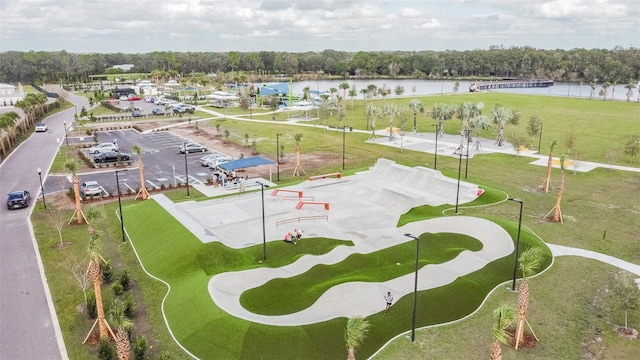 birds eye view of property featuring a water view