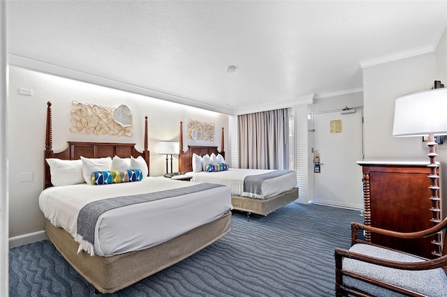 bedroom featuring dark carpet and ornamental molding