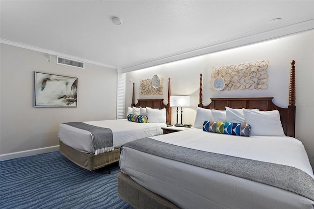 carpeted bedroom featuring crown molding