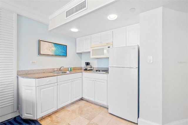 kitchen with sink, white cabinets, light tile patterned floors, crown molding, and white appliances