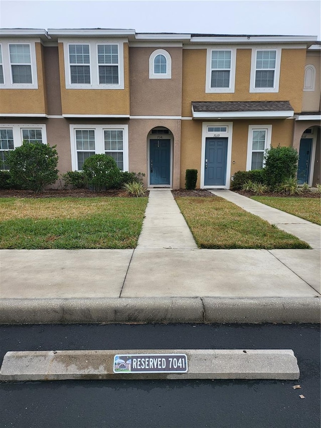 view of property with a front yard