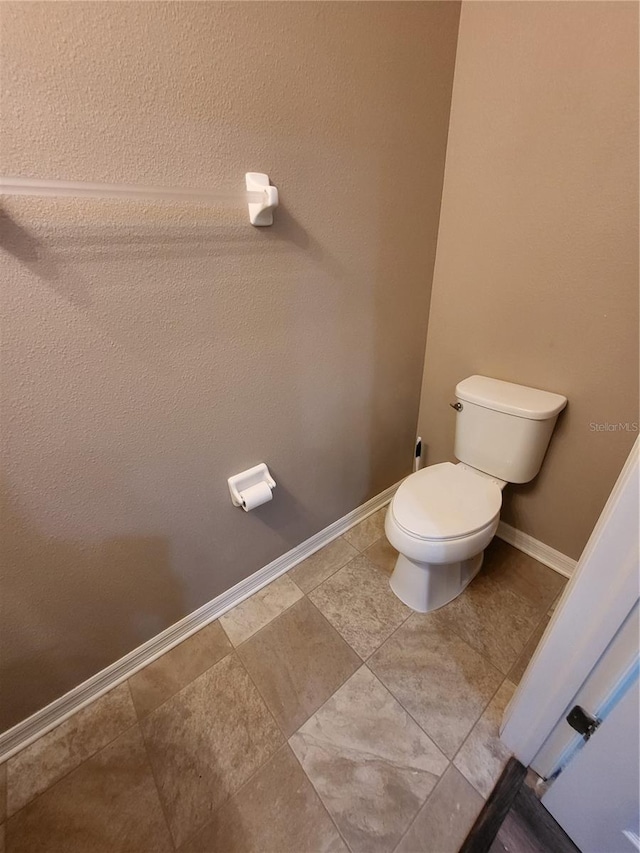 bathroom featuring toilet