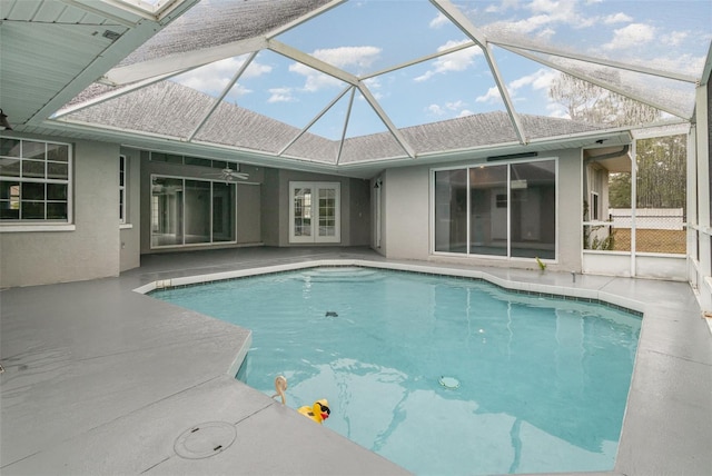 view of pool with a lanai