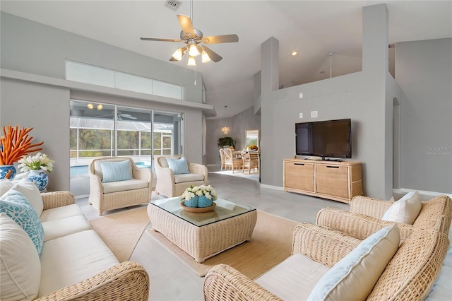 5366 Hader Rd, North Port, FL 34288 - living room featuring a ceiling fan, high vaulted ceiling, and visible vents