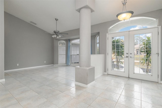 5366 Hader Rd, North Port, FL 34288 - interior space featuring ornate columns, french doors, ceiling fan, and light tile patterned floors
