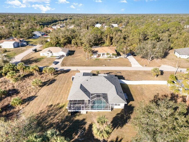 5366 Hader Rd, North Port, FL 34288 - drone / aerial view featuring a residential view and a wooded view