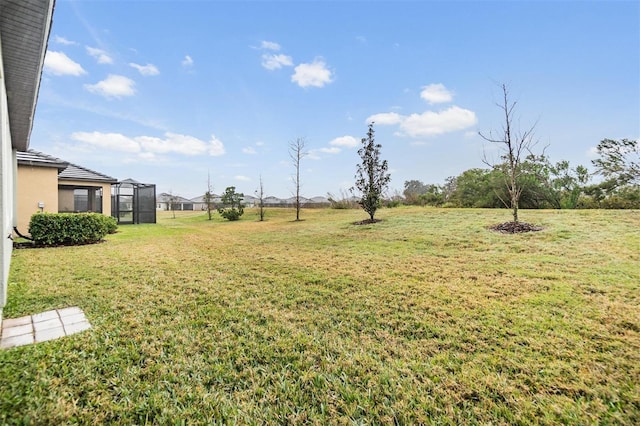 view of yard featuring a lanai