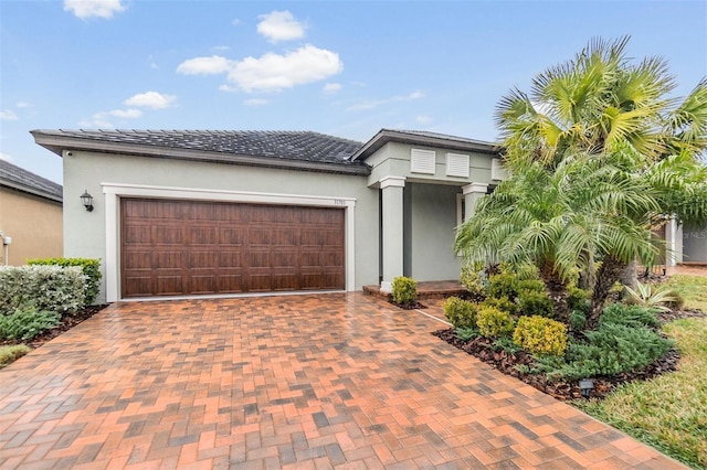 view of front of home with a garage