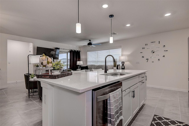 kitchen with sink, stainless steel dishwasher, an island with sink, pendant lighting, and white cabinets