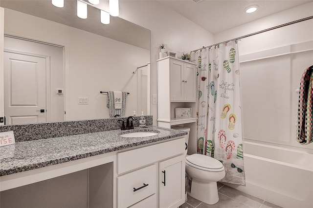 full bathroom with vanity, tile patterned floors, shower / bath combination with curtain, and toilet