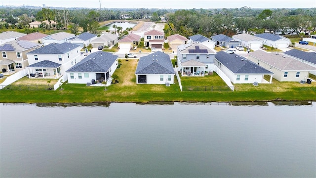 drone / aerial view with a water view