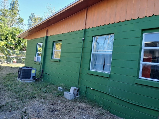 view of side of property featuring cooling unit