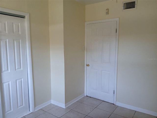 interior space featuring light tile patterned flooring