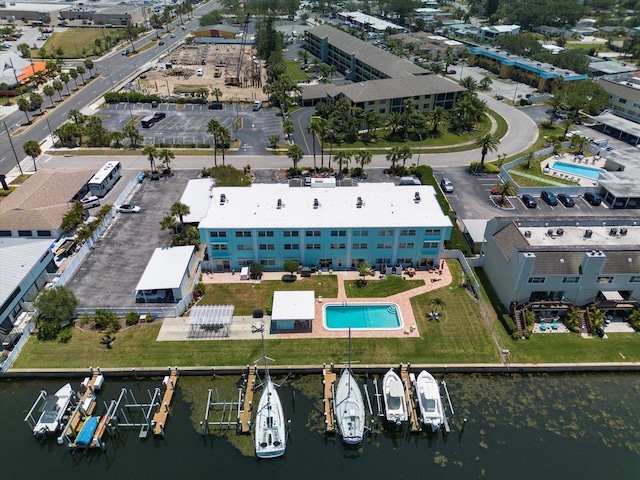 birds eye view of property featuring a water view