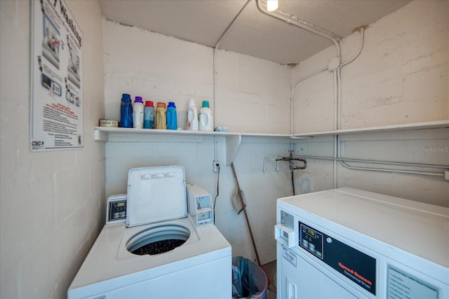 laundry room featuring washing machine and dryer