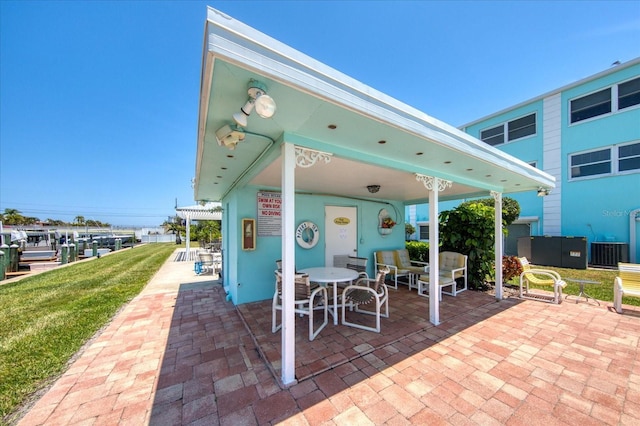 view of patio with central AC