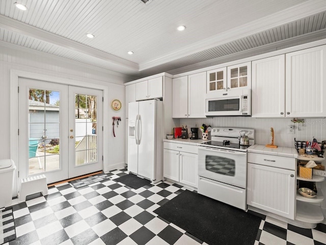 kitchen featuring white cabinetry, white appliances, crown molding, and french doors