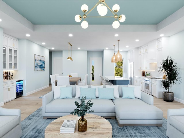 living area with light wood finished floors, wine cooler, baseboards, and recessed lighting