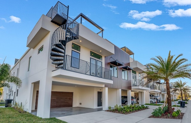 view of property featuring cooling unit and a garage