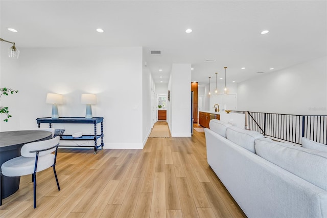 living room with light wood-type flooring