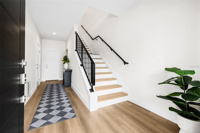 460 87th Ave N, Saint Petersburg, FL 33702 - entrance foyer featuring baseboards, light wood-style floors, stairway, and recessed lighting
