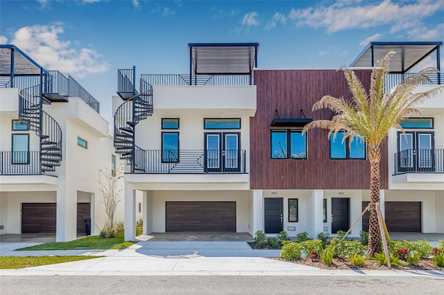460 87th Ave N, Saint Petersburg, FL 33702 - view of front of property with stairs, stucco siding, an attached garage, and concrete driveway