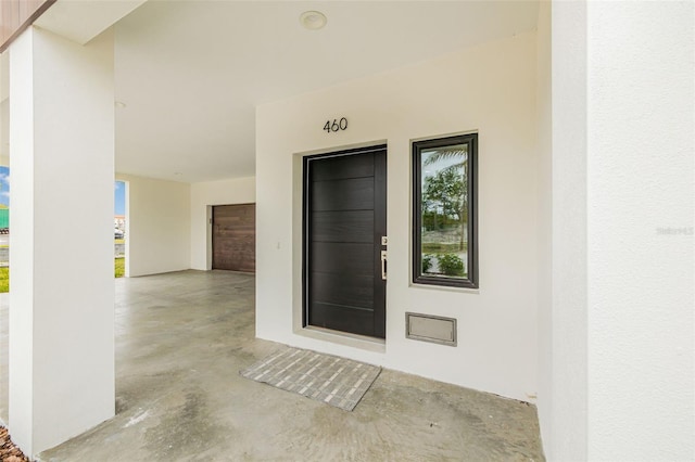 460 87th Ave N, Saint Petersburg, FL 33702 - property entrance featuring stucco siding