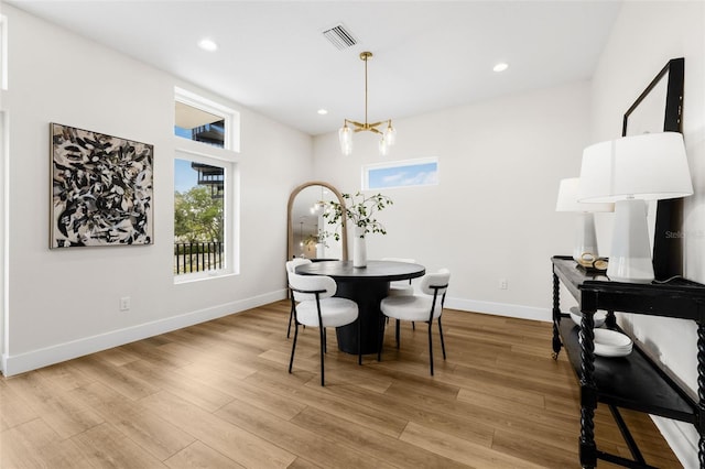 460 87th Ave N, Saint Petersburg, FL 33702 - dining space with baseboards, recessed lighting, visible vents, and light wood-style floors