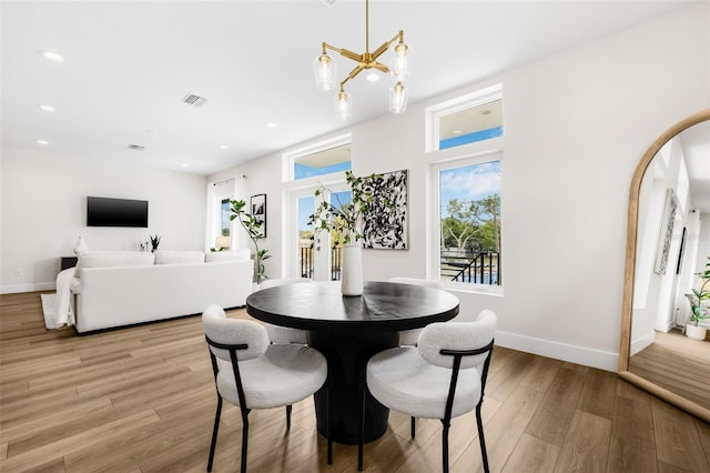 460 87th Ave N, Saint Petersburg, FL 33702 - dining room featuring baseboards, visible vents, recessed lighting, and light wood finished floors