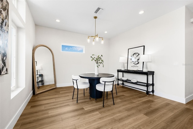 460 87th Ave N, Saint Petersburg, FL 33702 - dining space with light wood-style flooring, recessed lighting, baseboards, and visible vents