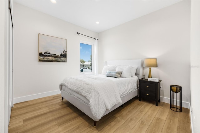 460 87th Ave N, Saint Petersburg, FL 33702 - bedroom with baseboards, light wood-style floors, and recessed lighting