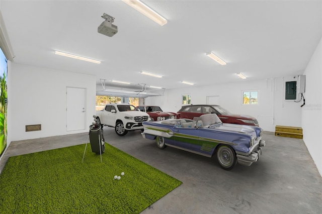460 87th Ave N, Saint Petersburg, FL 33702 - garage with a garage door opener and electric panel