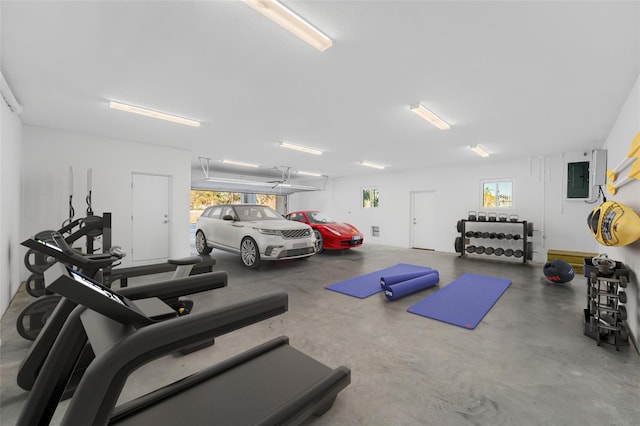 460 87th Ave N, Saint Petersburg, FL 33702 - workout area featuring electric panel and a garage