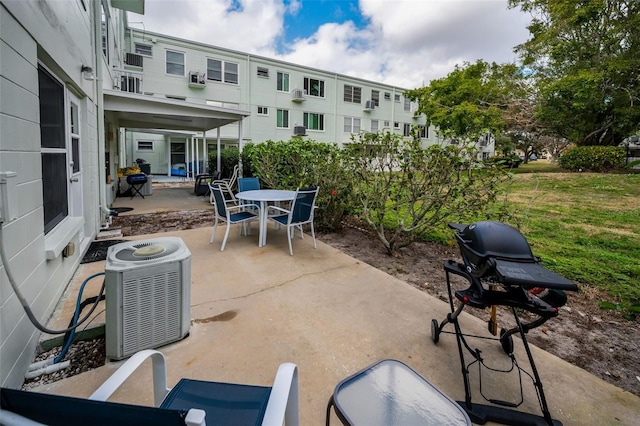 view of patio / terrace featuring grilling area and central air condition unit