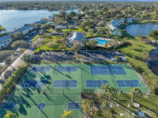 birds eye view of property featuring a water view