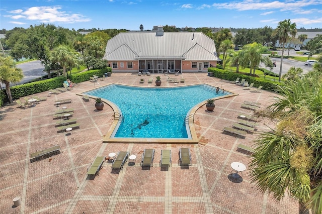 view of pool featuring a patio