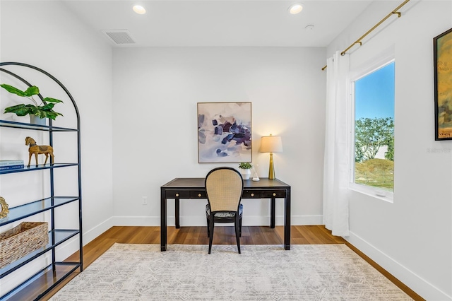 office space featuring light hardwood / wood-style floors