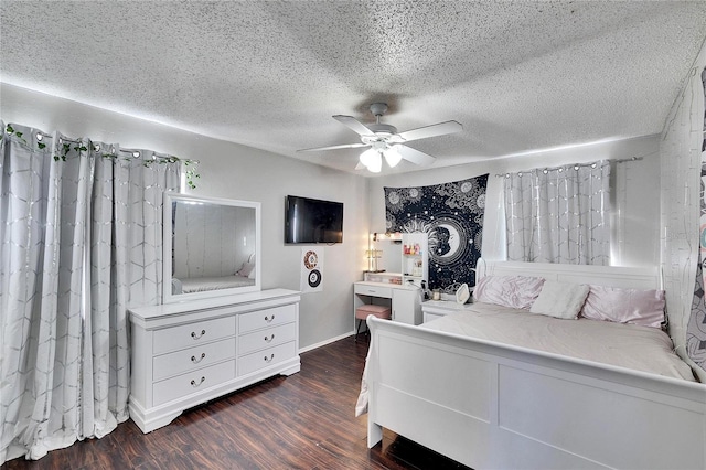 bedroom with ceiling fan, dark hardwood / wood-style flooring, and a textured ceiling