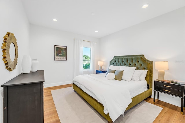 bedroom with light hardwood / wood-style flooring