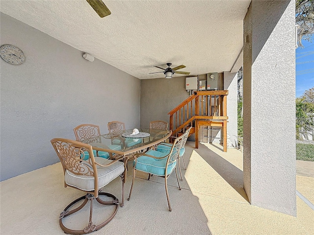 view of patio featuring ceiling fan