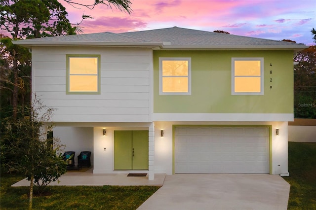 view of front of house with a garage