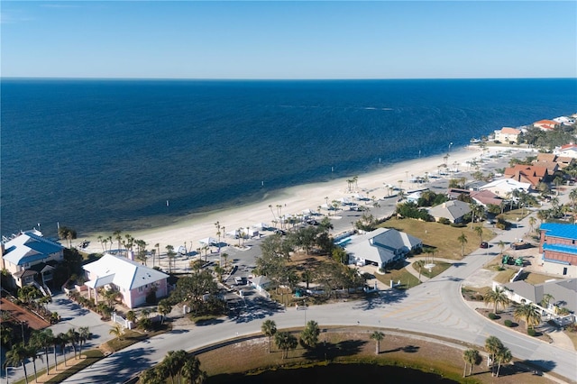 aerial view featuring a water view and a beach view