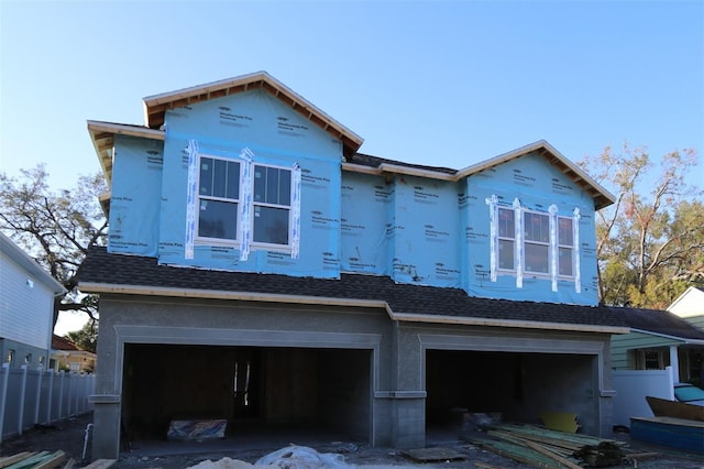 view of front of property with a garage