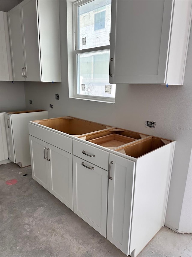 kitchen featuring white cabinetry