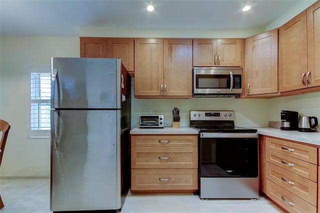 kitchen featuring appliances with stainless steel finishes