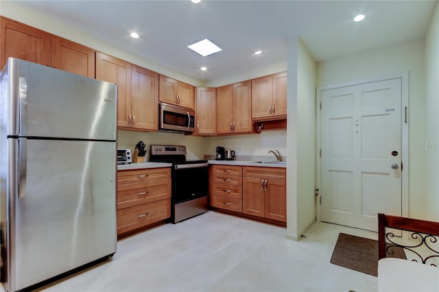 kitchen featuring appliances with stainless steel finishes and sink