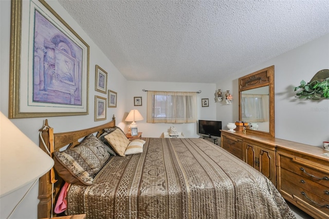 bedroom featuring a textured ceiling