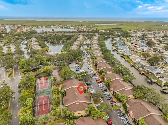 drone / aerial view featuring a water view