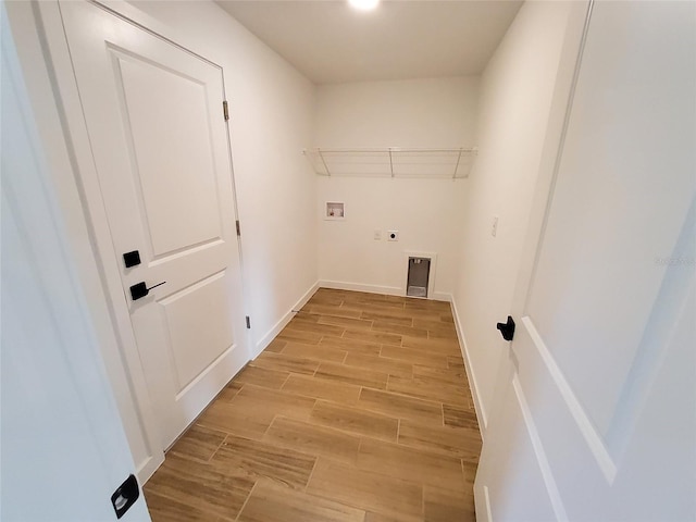 laundry room with washer hookup and electric dryer hookup