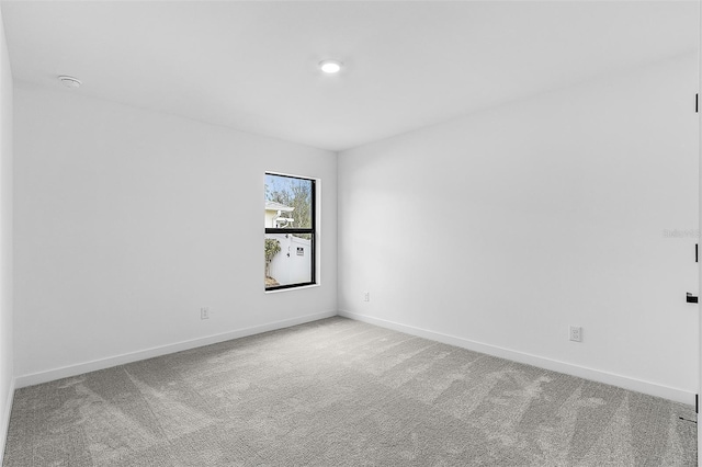 5710 Humkey St, North Port, FL 34291 - carpeted spare room with baseboards